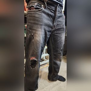 True Religion mens jeans w/ classic red stitching distressed style